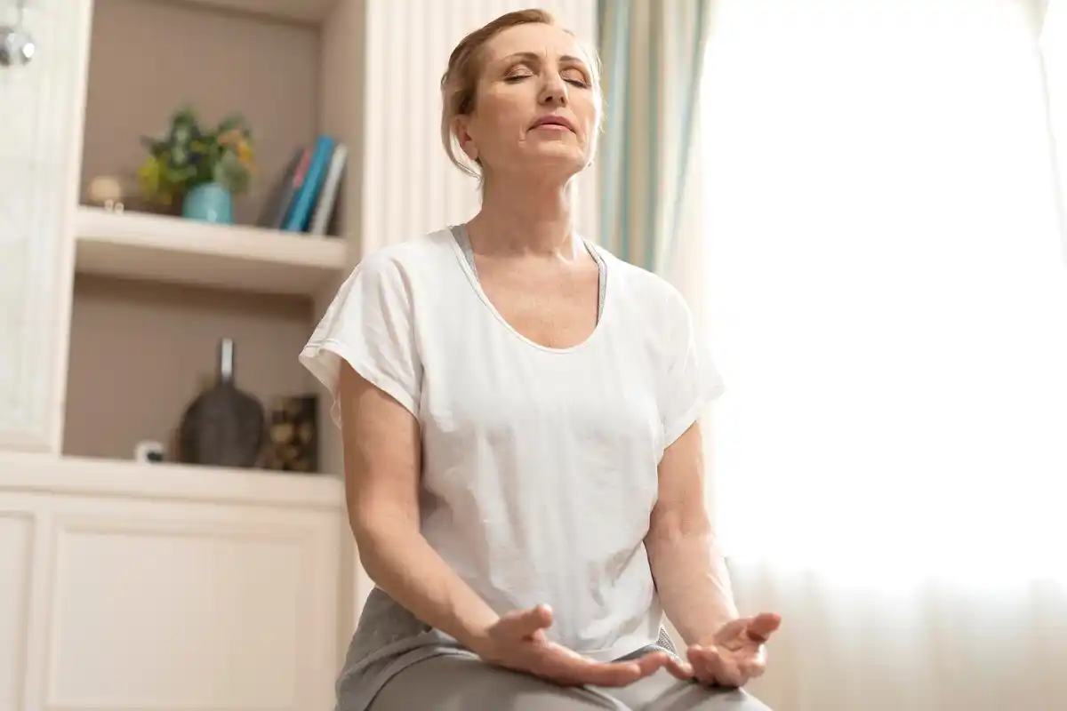 relaxed person practicing breathing technique