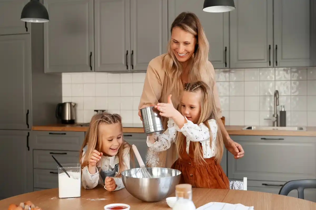 family cooking helping kitchen
