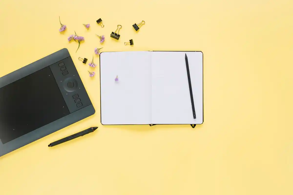 simple creative workspace with notebook and pencil