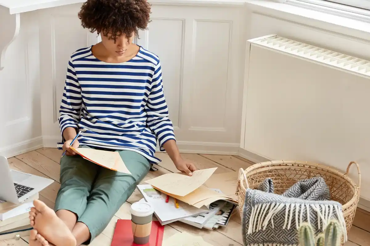 cozy tidy living room with cleaning basket and fresh air