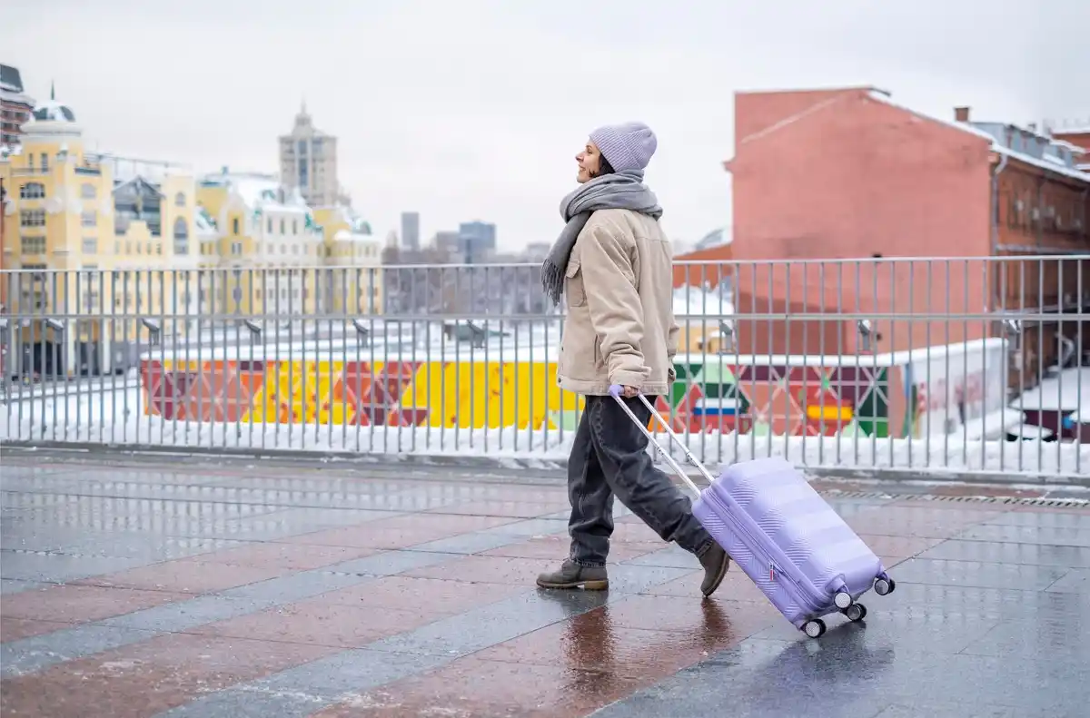 stress free travel tips suitcase city vacation