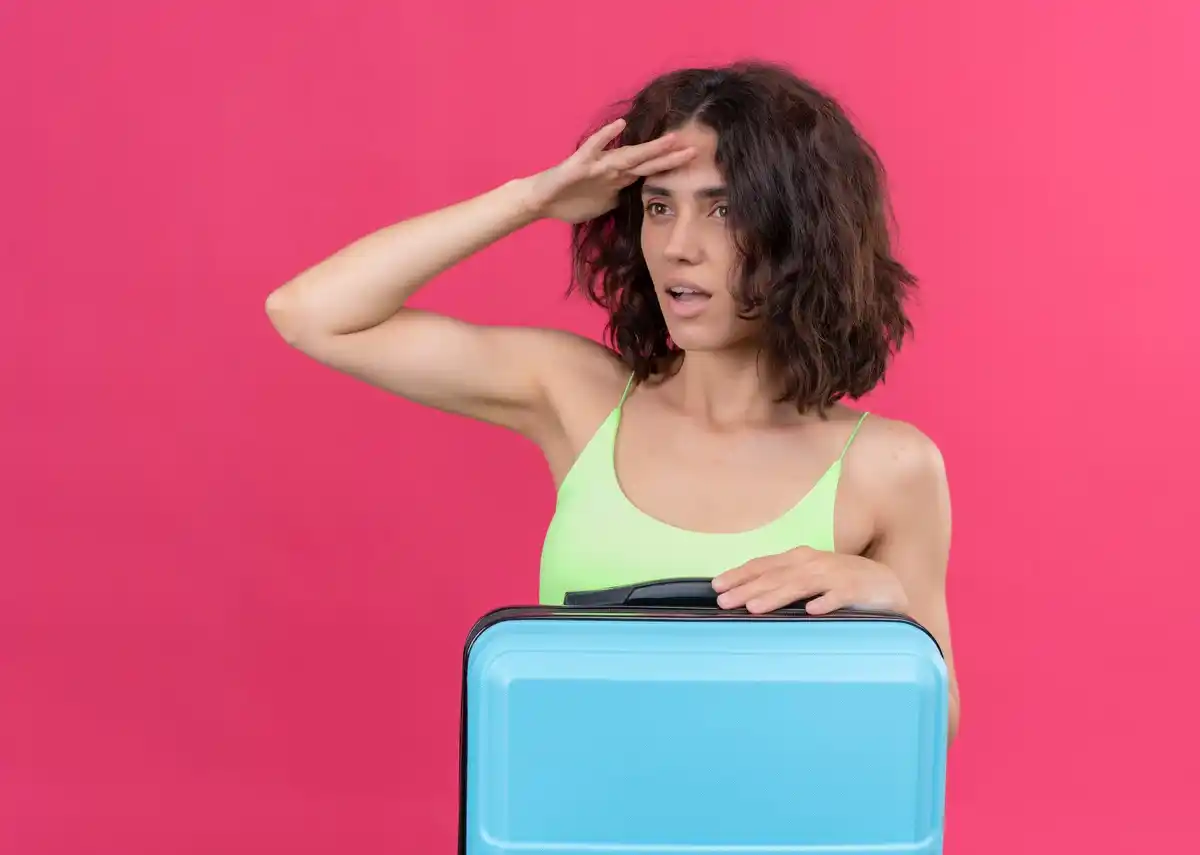 summer travel mistakes suitcase beach vacation