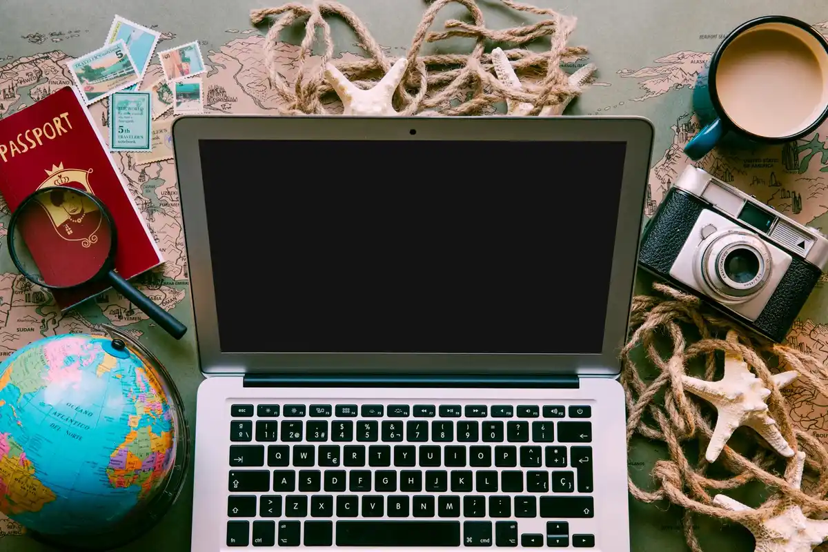 flight booking laptop travel screen