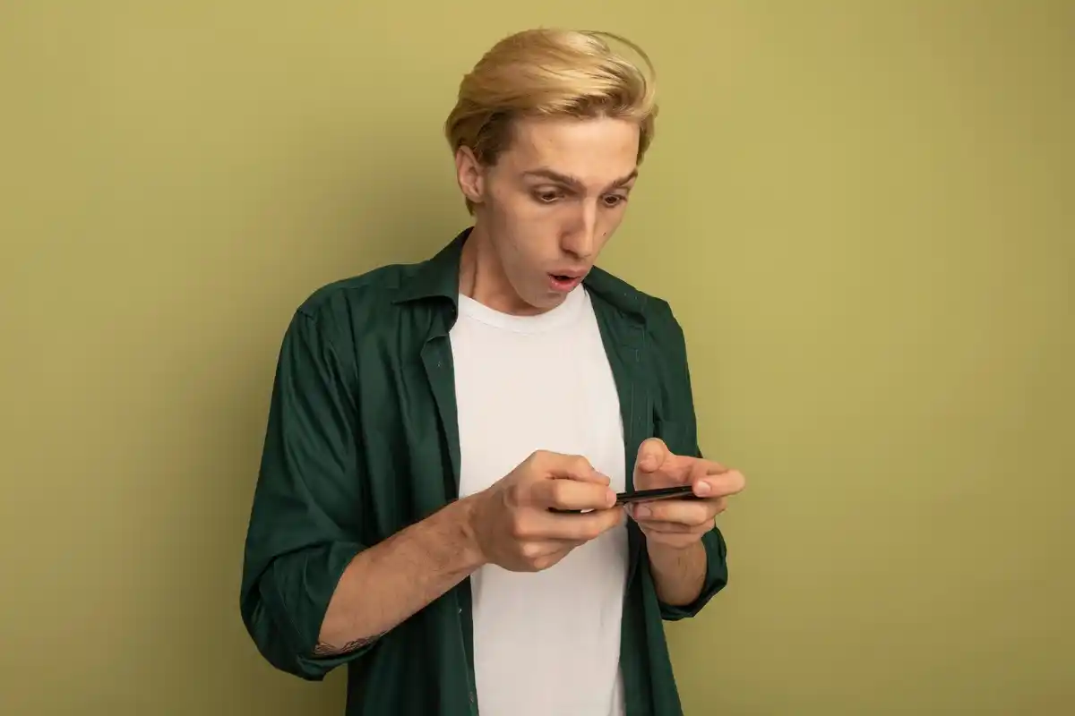 person closing apps on smartphone