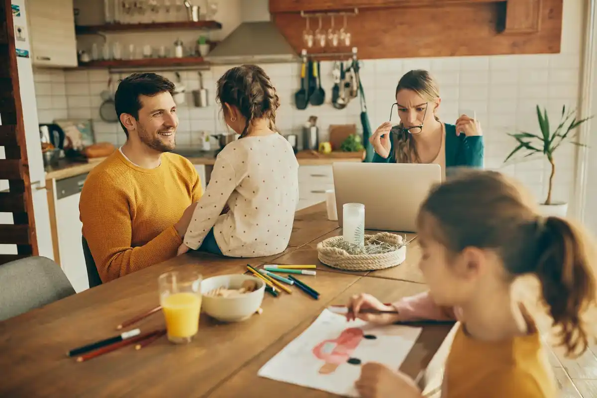 family organizing schedule calendar tablet planning
