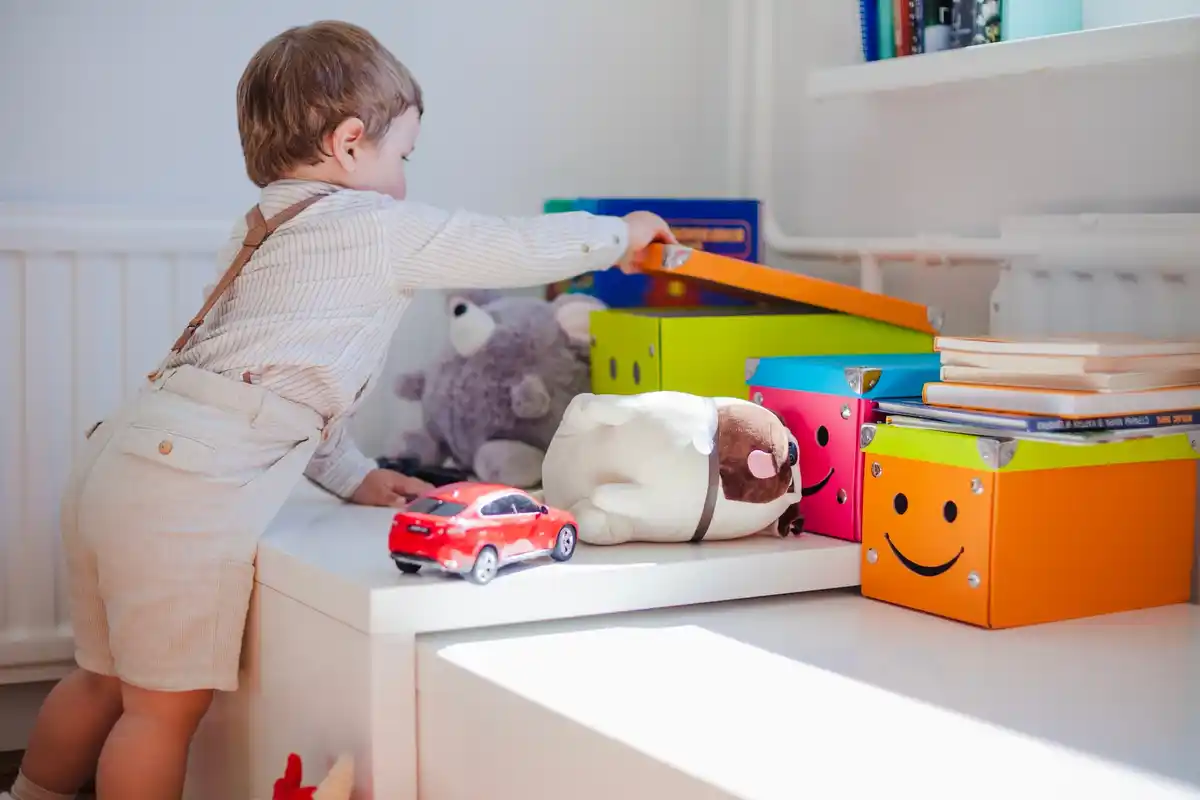 storage bins for toys and shoes in living room