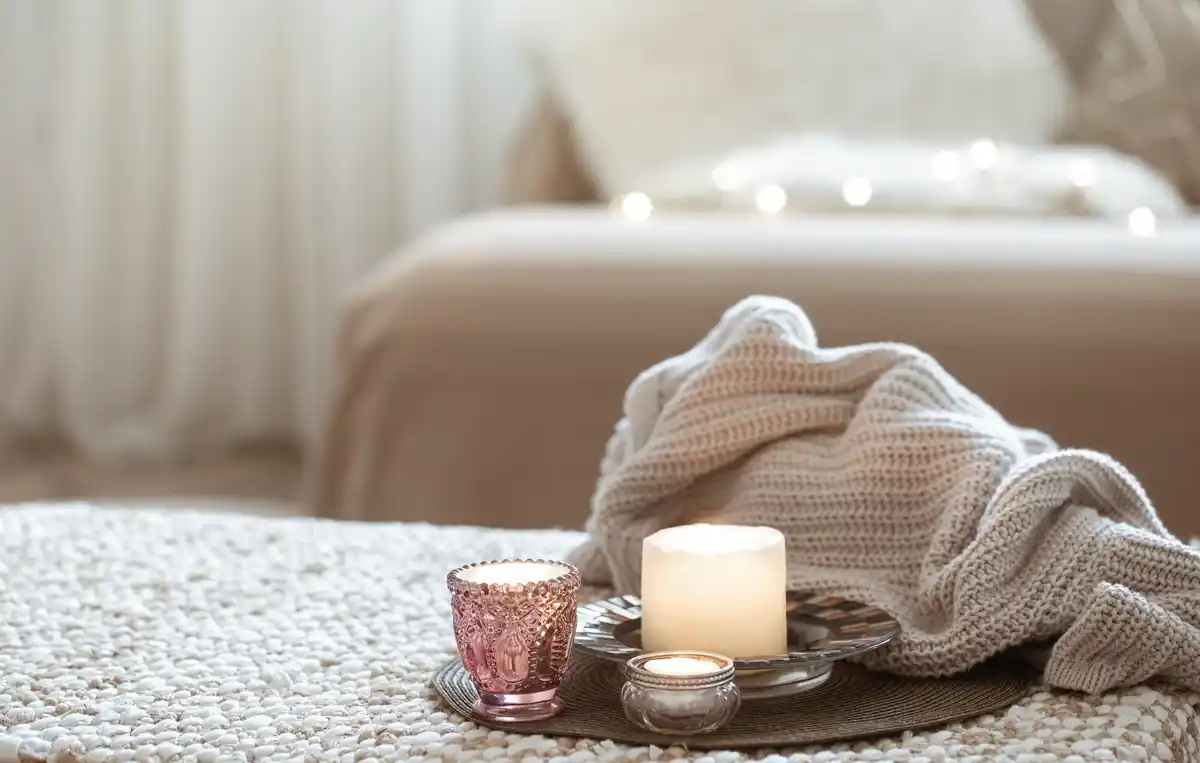 cozy home lighting with candles and LED strips