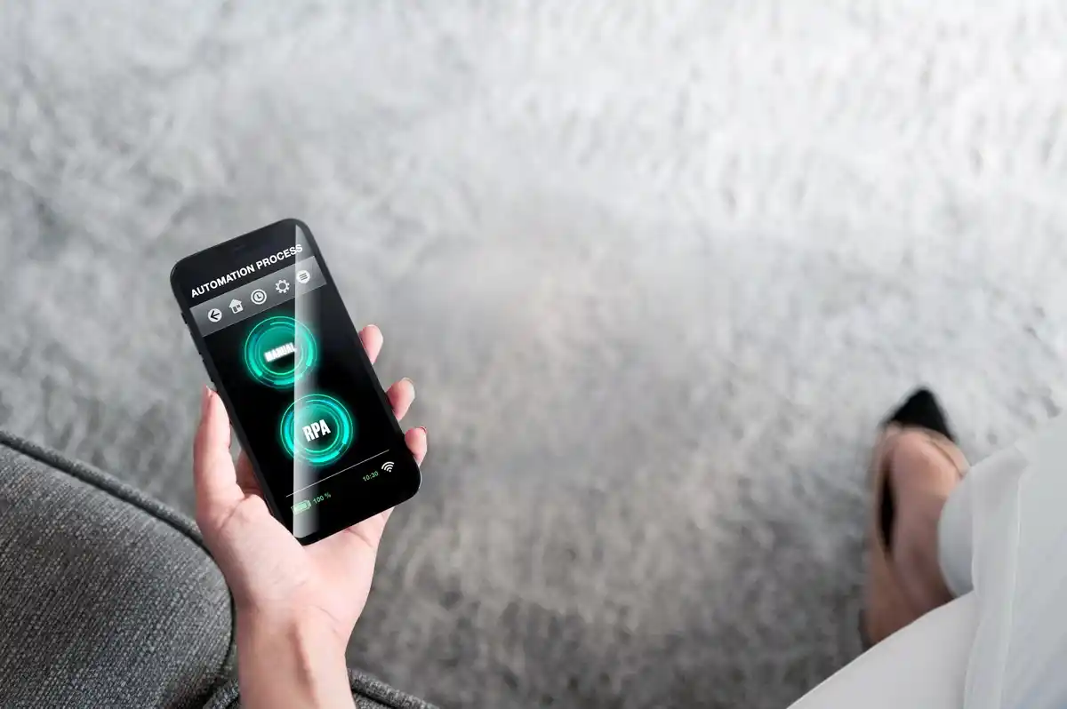 person charging phone with battery icon showing high level