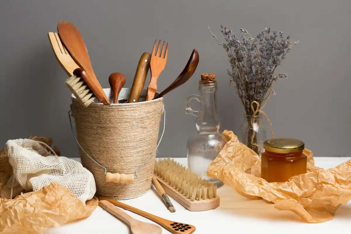 Dutch cleaning tools in a sunny kitchen