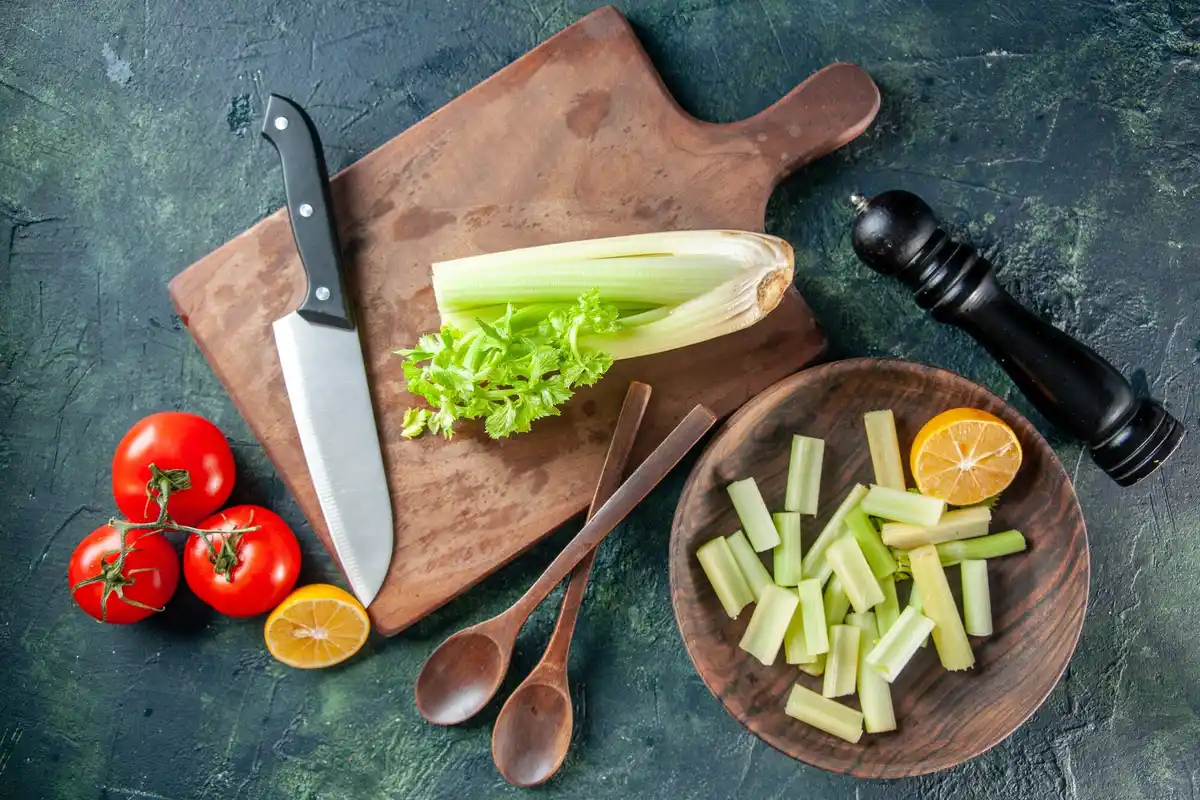 sharp kitchen knife and measuring cup