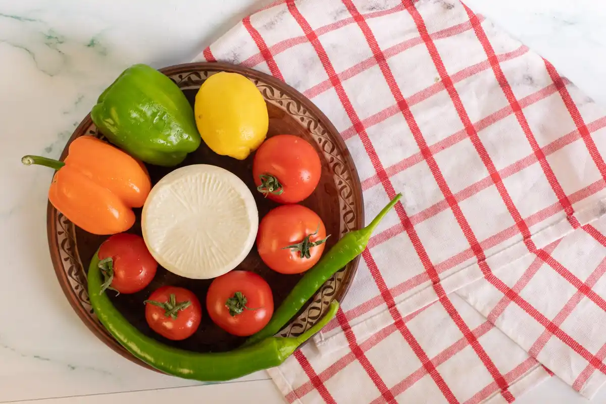 fresh vegetables wrapped in paper towels kitchen storage