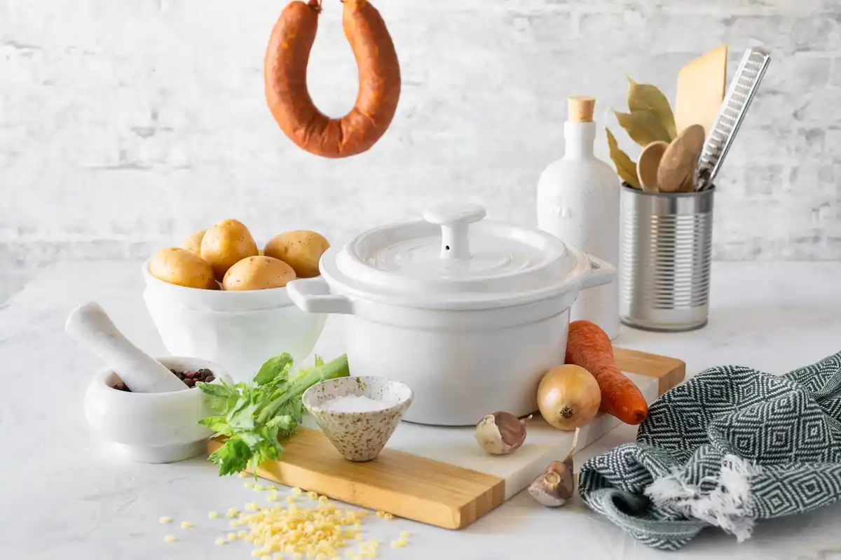 Dutch oven and chef knife in kitchen
