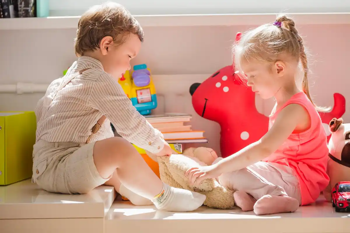 kids playing with toys organizing storage box