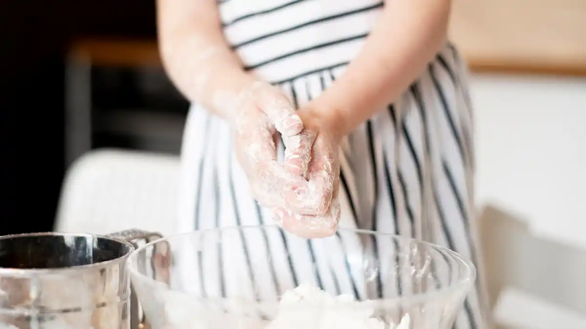 electric stand mixer kneading dough close up
