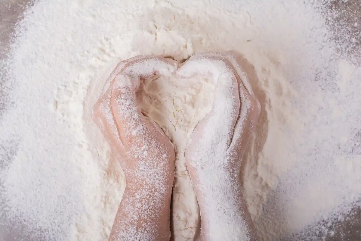 kneading dough by hand close up