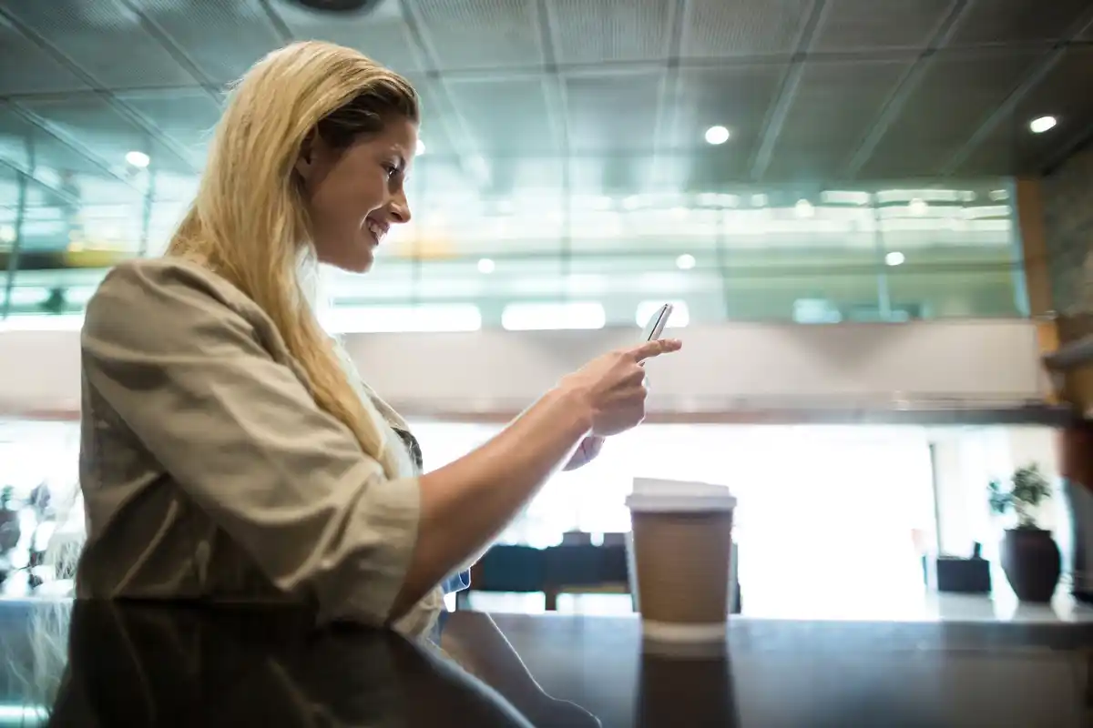 relaxed traveler enjoying quiet airport lounge