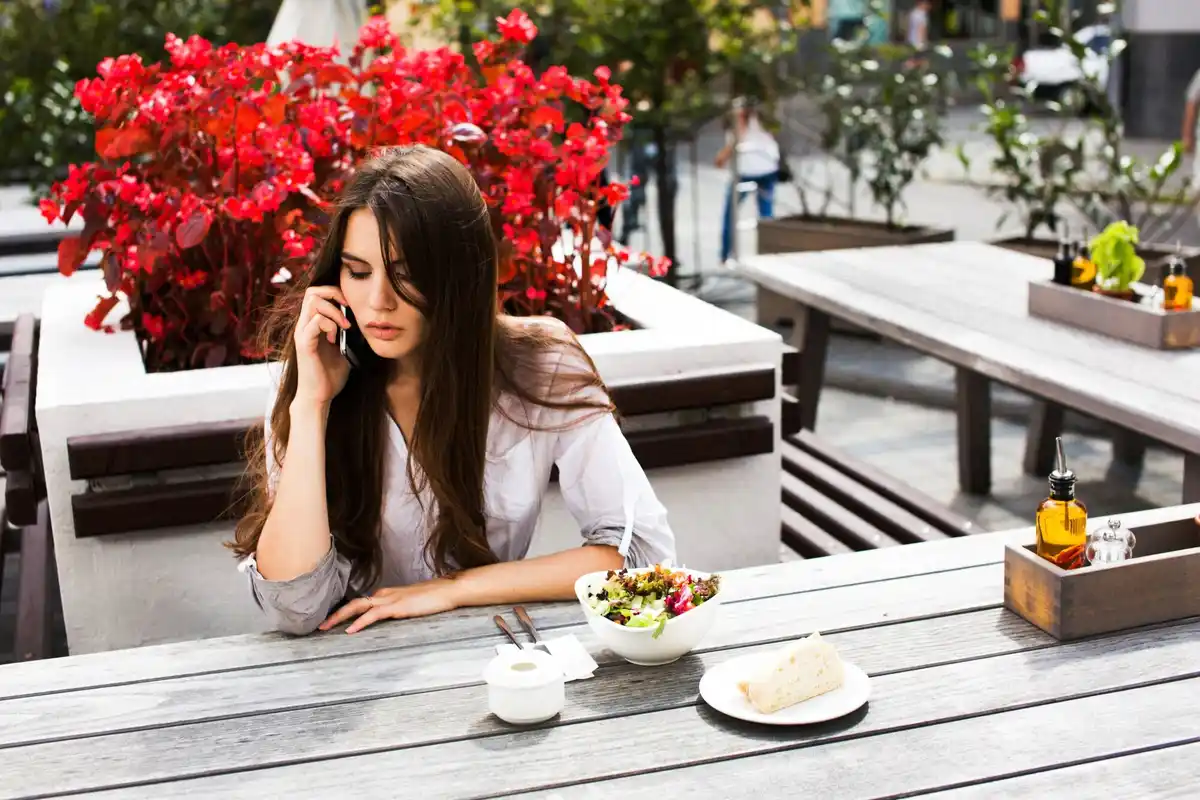 relaxed traveler enjoying holiday outdoor cafe