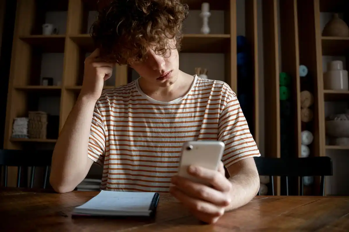 person overwhelmed with notifications multitasking
