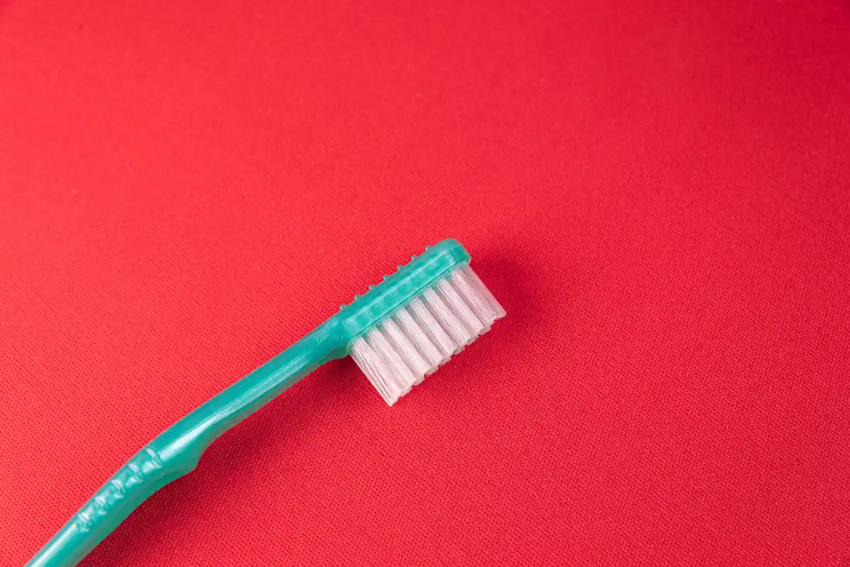 old toothbrush cleaning small crevices