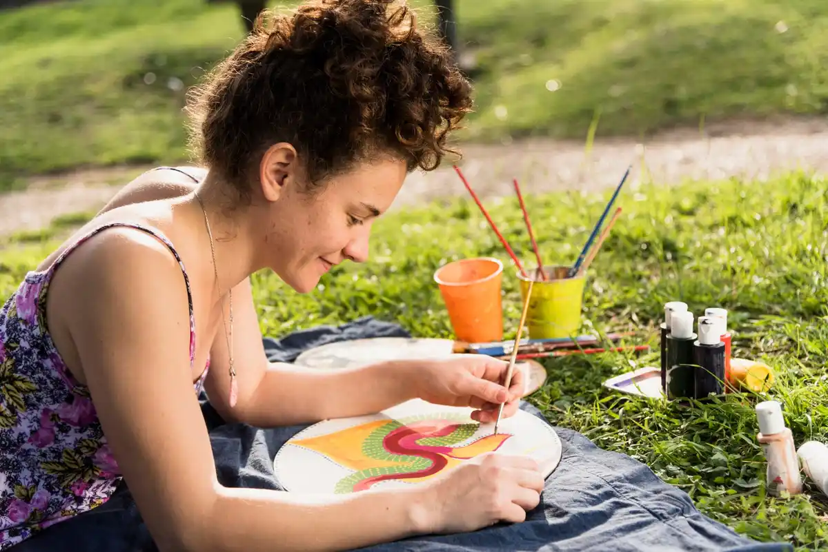 artist working sketching outdoors creative space