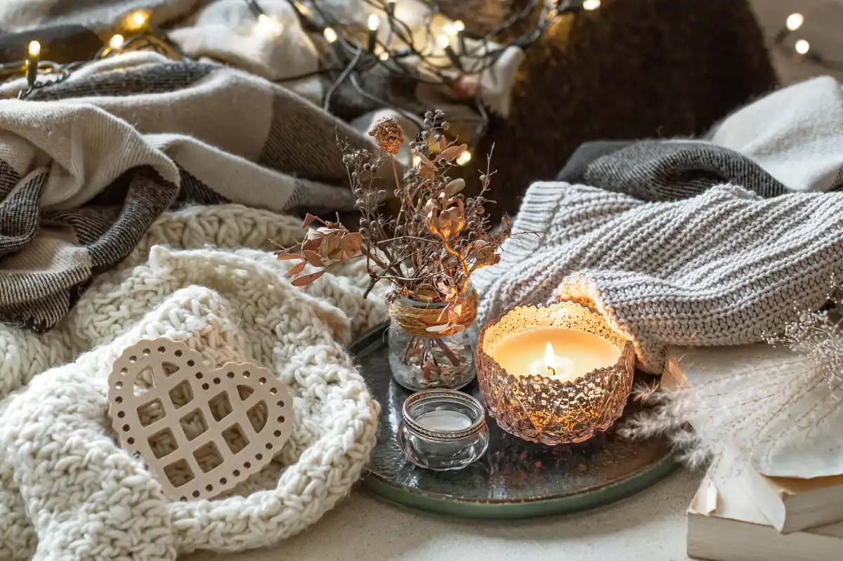 cozy living room with plants and candles