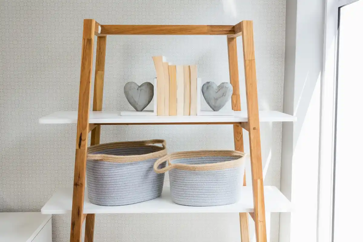 organized tiny apartment shelves with labelled boxes