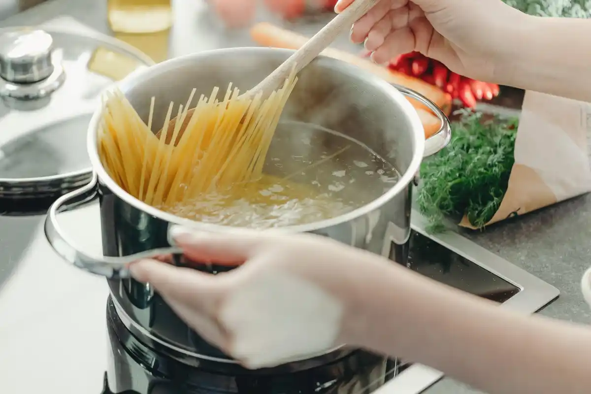 cooked pasta in boiling water