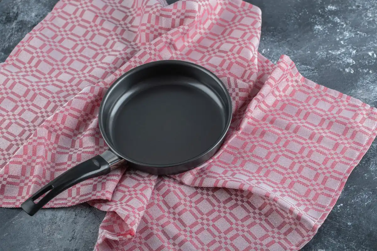 overheated pan in kitchen
