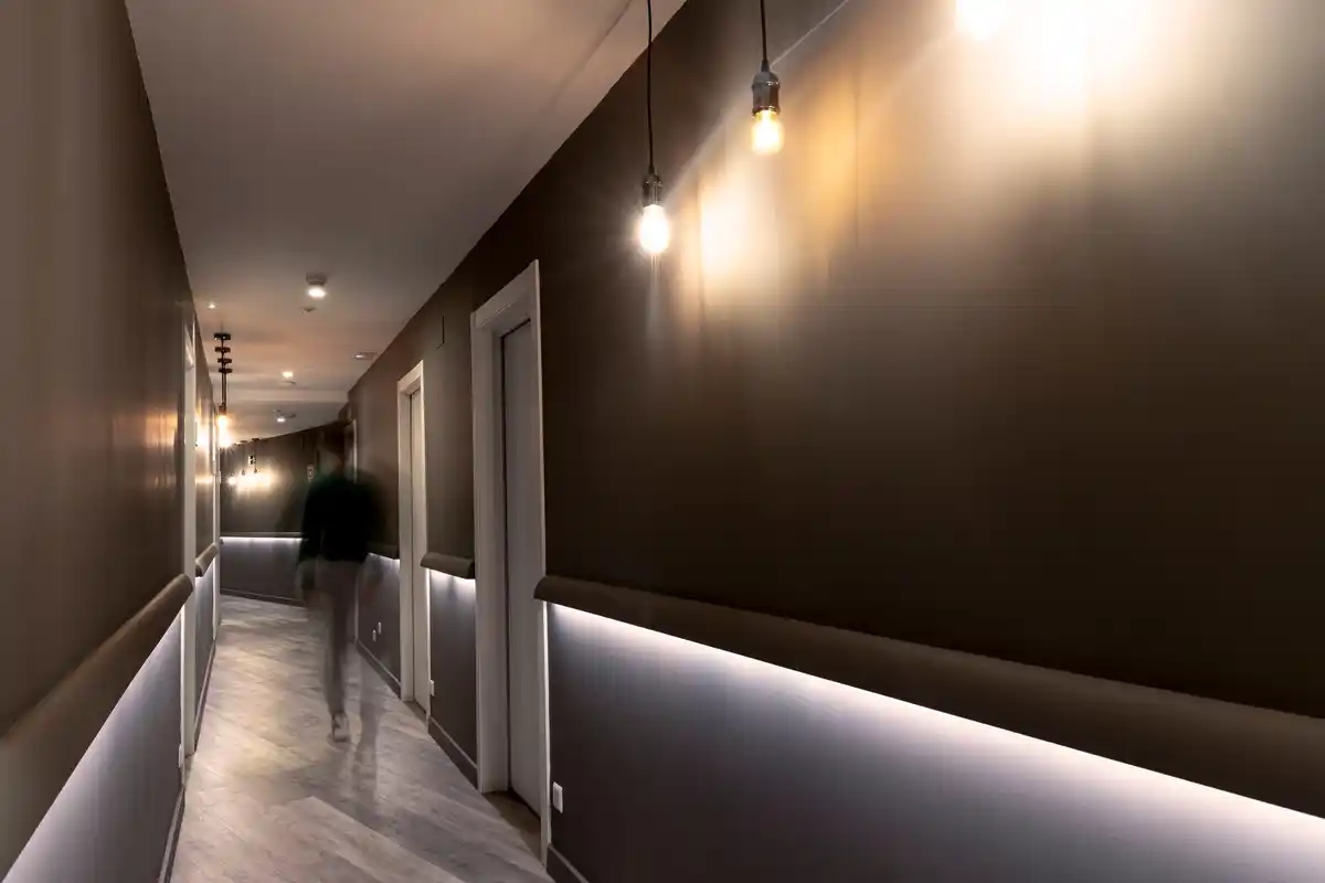 modern hallway with multiple small mirrors