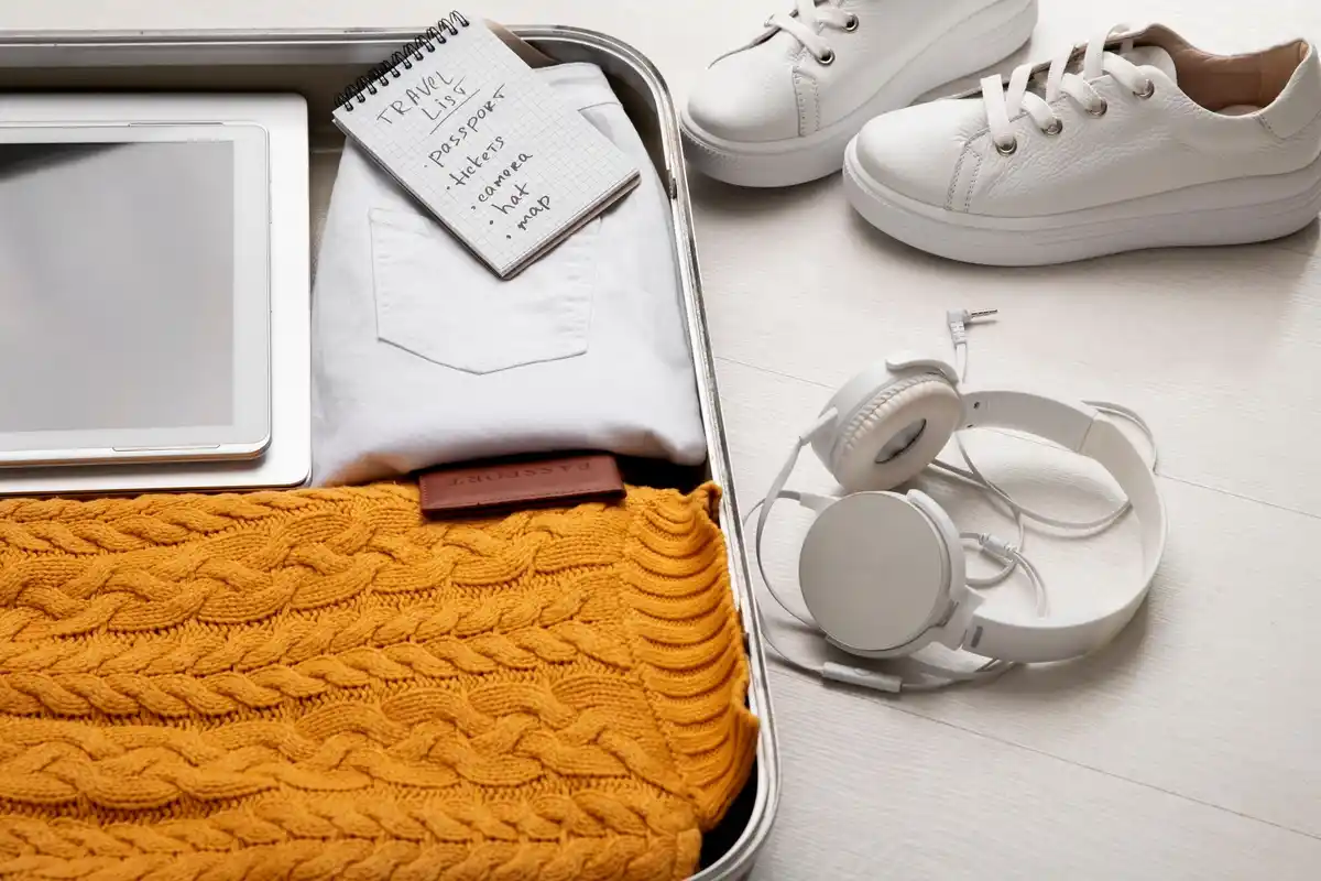 travel packing tips suitcase with organized clothes