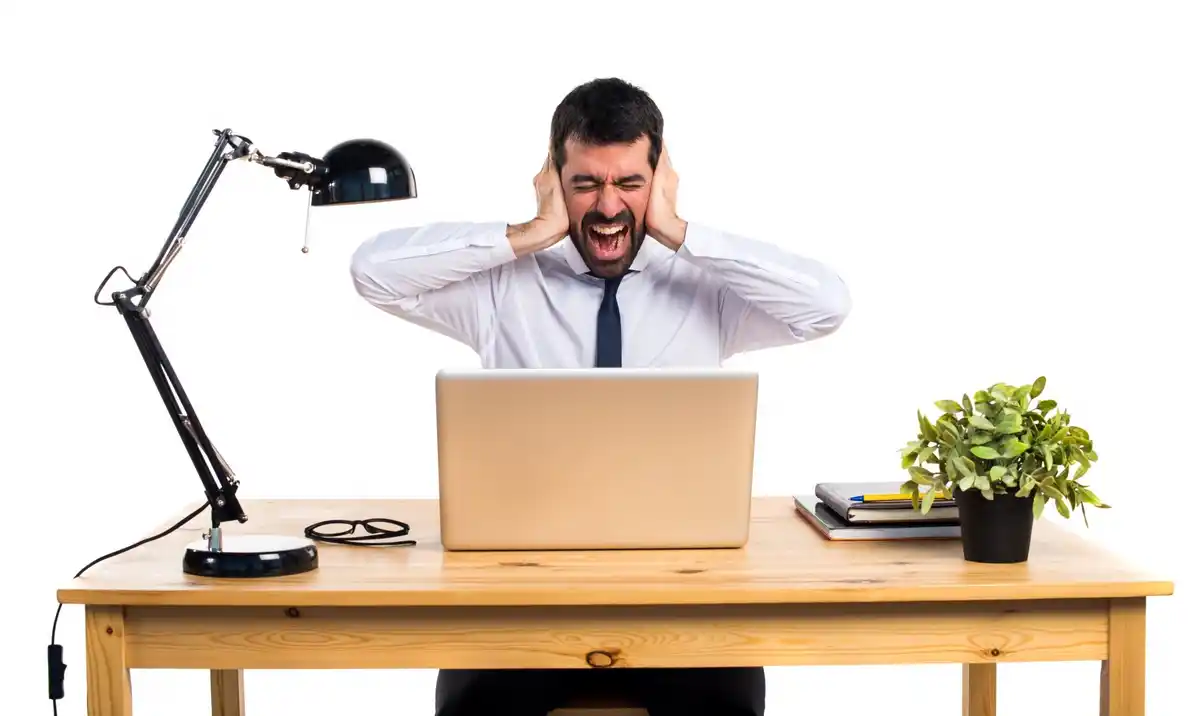 multitasking office work frustrated man