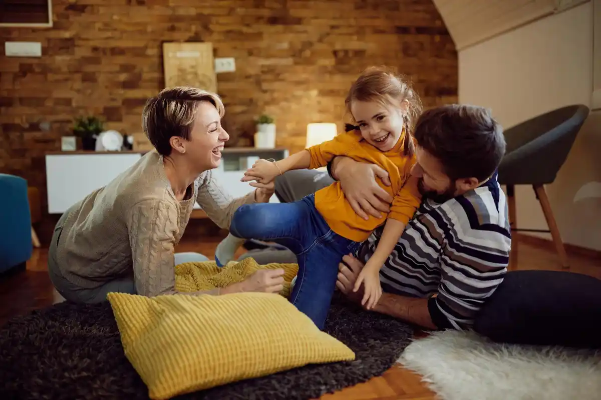 family laughing together home