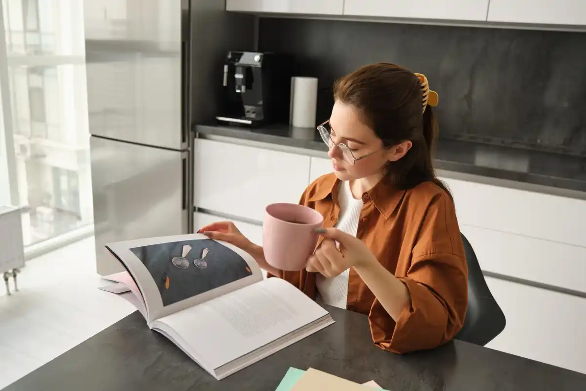 relaxed person with planner and tea