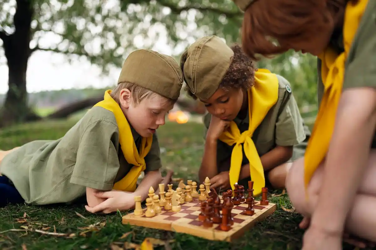 family playing board games Netherlands park
