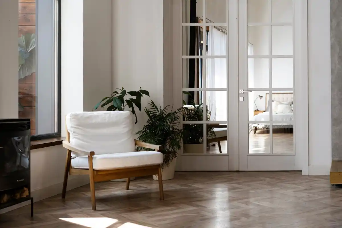 bright cozy living room with natural light and mirror