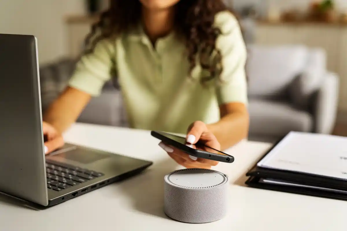 smart speaker with voice assistant in kitchen
