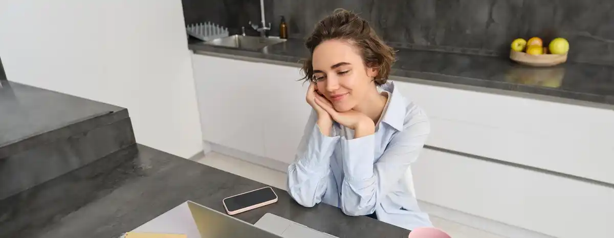 happy professional working less hours at home