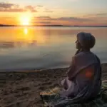relaxed person enjoying vacation in the Netherlands beach sunset