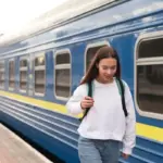 Dutch traveler using offline maps on smartphone, scenic Dutch train ride, local travel hacks Netherlands