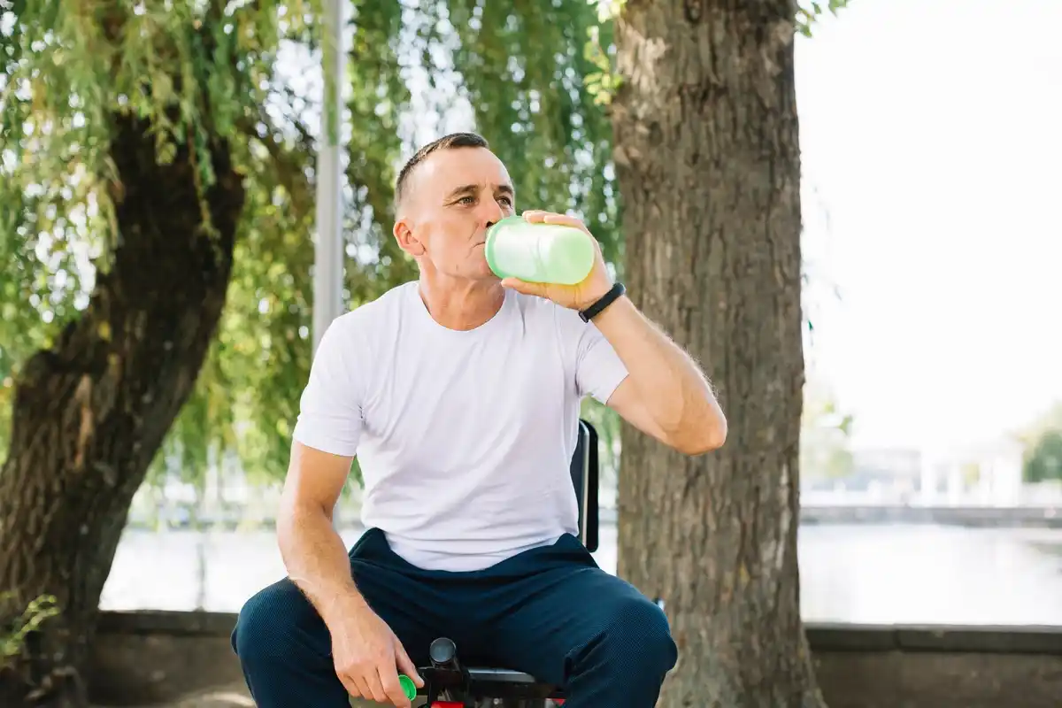 Dutch person drinking water outdoors