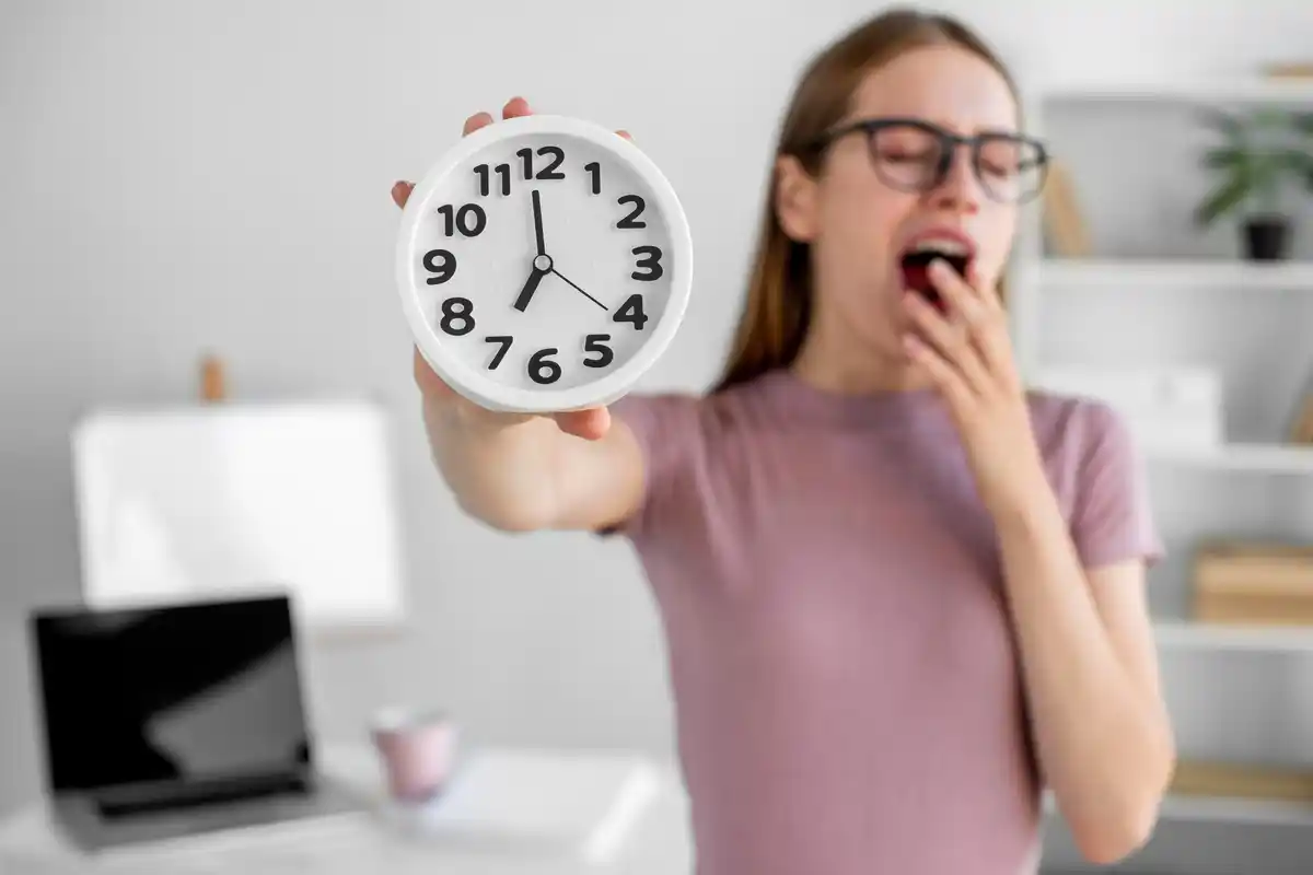 frustrated person wasting time clock office