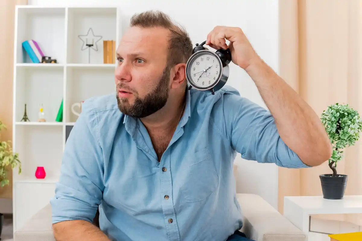 waste time at work clock frustrated person