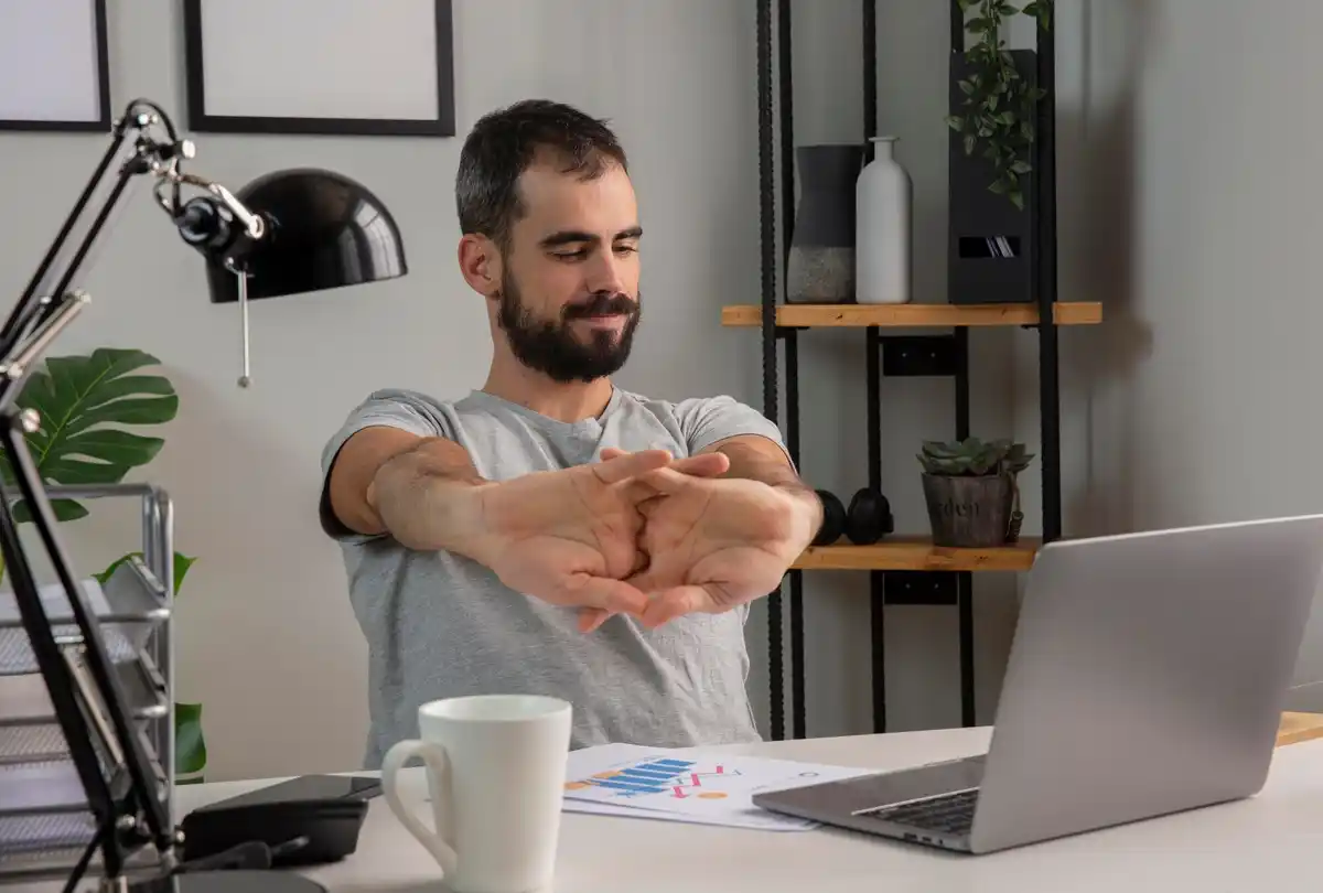 productive focused man working with timer laptop