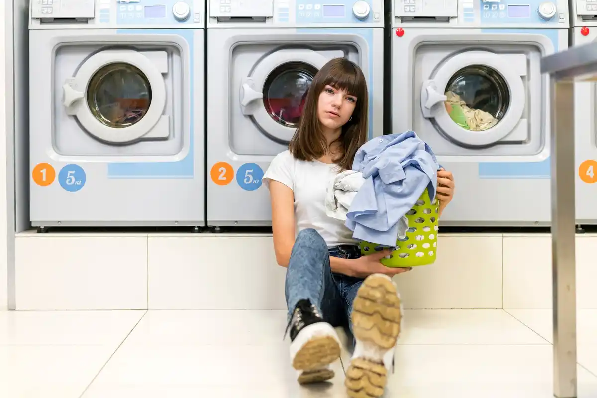laundry with washing machine and instruction labels