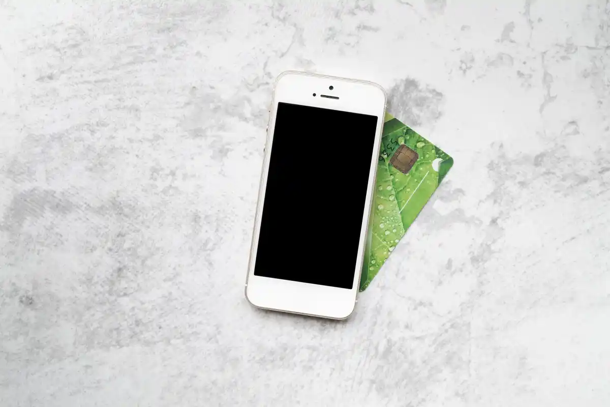 smartphone with SIM card and money saving concept