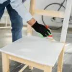 vintage wooden furniture restoration hands varnishing