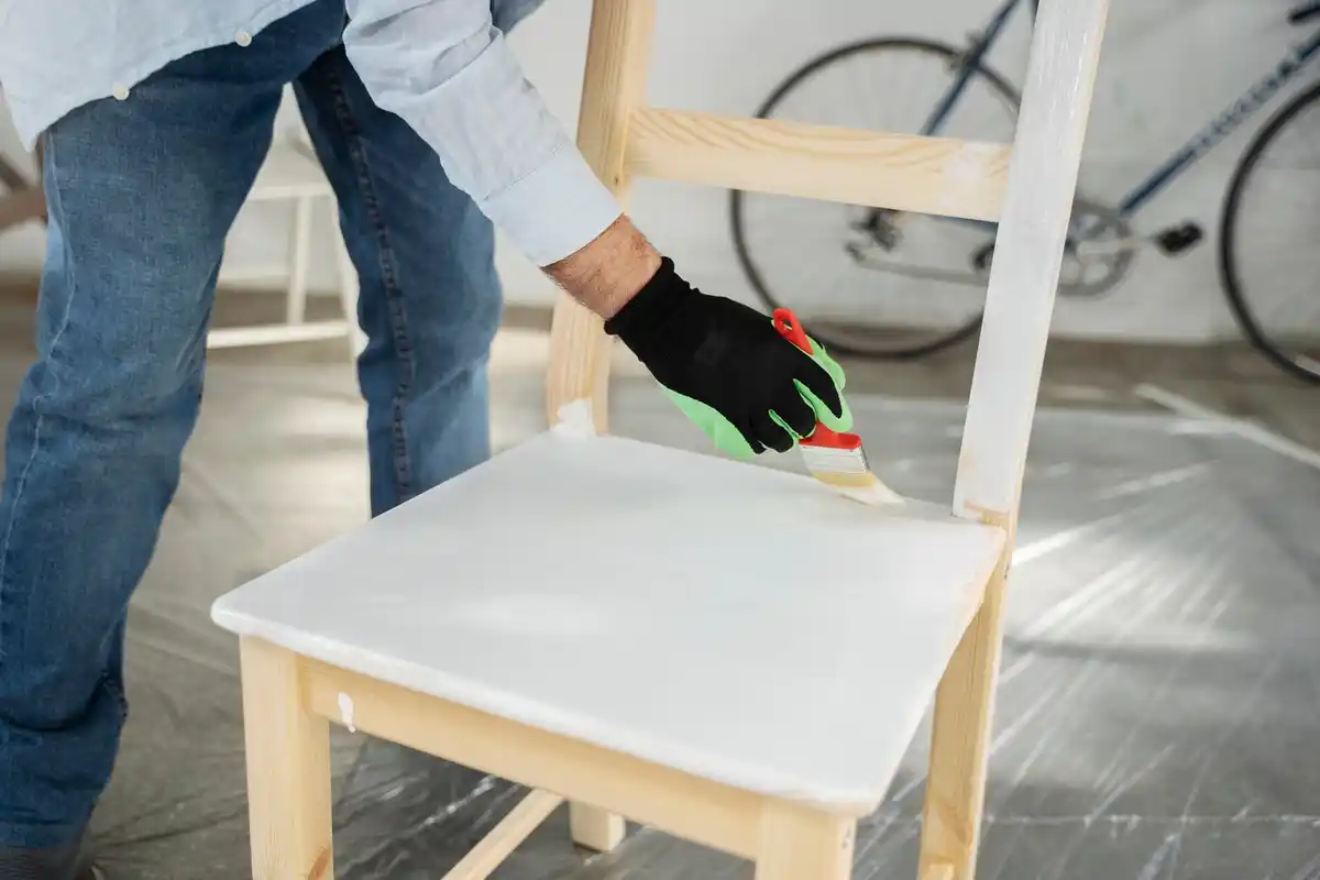 vintage wooden furniture restoration hands varnishing