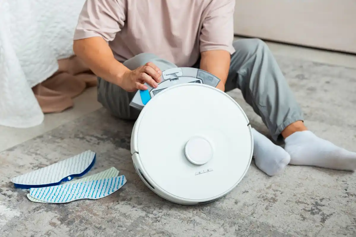 modern cleaning gadgets hands with vacuum