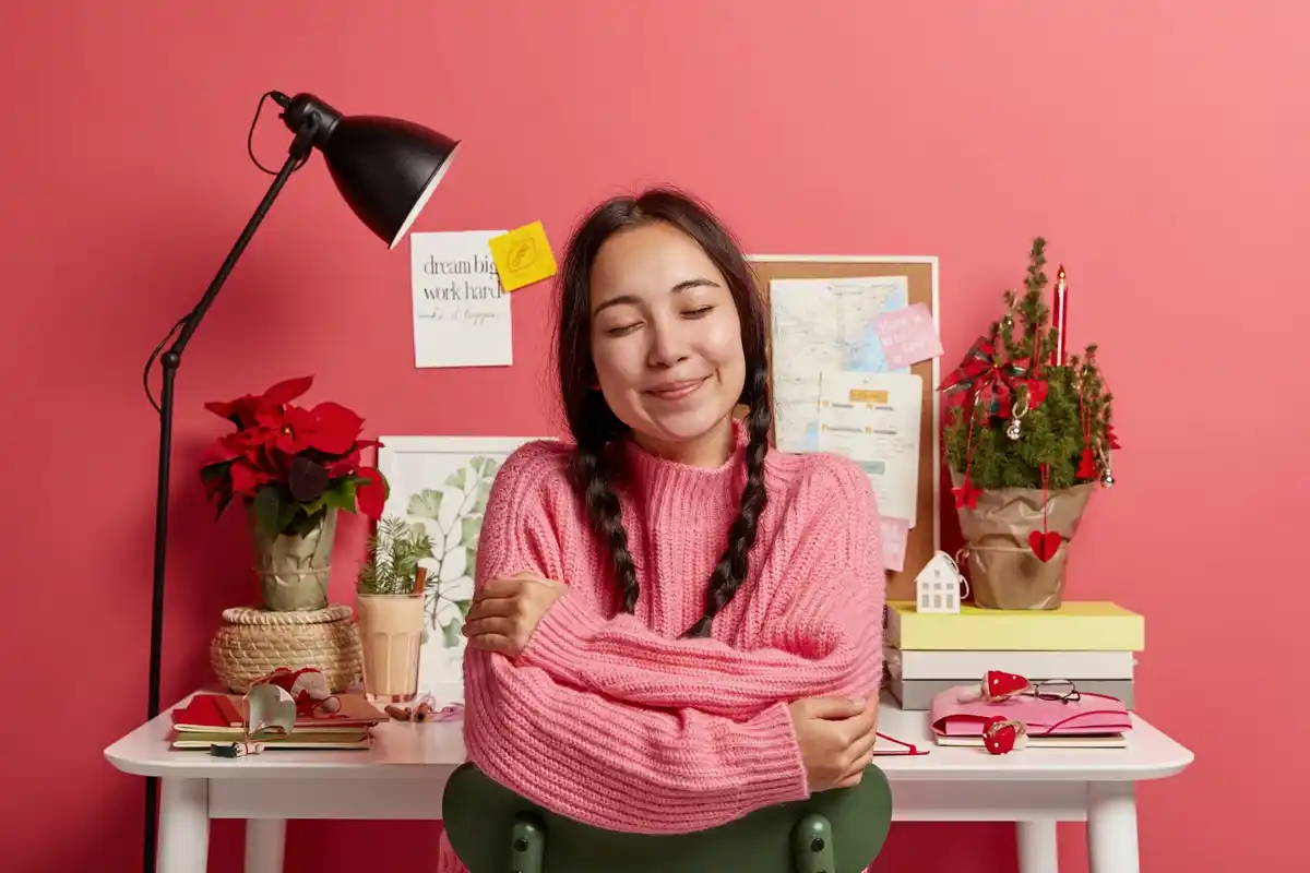 relaxed woman crafting at home with colorful materials