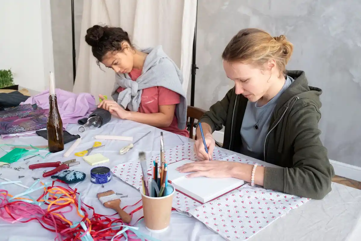 Dutch woman sewing with careful attention craft
